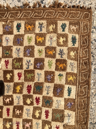 Interesting mystery textile from a local home. Crammed with all manner of little creatures. Dogs, cats, camels, aliens? Thickly constituted. Looks like all cotton? Backing might be linen? Few creatures done in  ...