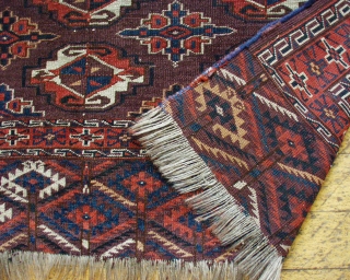 Antique Yomud chuval. Nicely drawn with interesting details. Good quality wool. Even low pile. All natural colors. ca. 1880 oe earlier. 2' 4" x  3' 9"
      