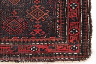 Antique large Baluch bagface with a good design. All natural colors featuring a pretty blue green field. Thin with overall low pile. Edges rough and a small spot of damage in upper  ...