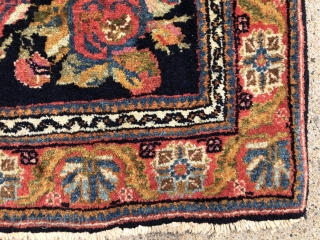 Antique little Persian bidjar mat in excellent condition with charming rose design field. Overall good high pile with typical thick bidjar weave. Lovely colors. Tiny little weaving packs a big punch. Reasonably  ...