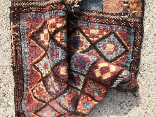 Antique complete Persian tribal bag, possibly Afshar , Luri, Baluch? Full thick high pile with very slight wear. Original back, closure tabs and goat hair wrapped selvages. All natural colors including lots  ...