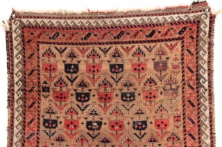 Antique small Baluch rug. Soft, supple and sophistacated. Older piece with very delicate drawing. All natural colors including a beautiful soft purple. Camel wool ground. Fair condition for the age with some  ...