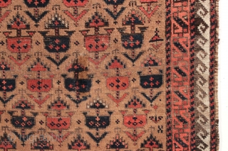 Antique small Baluch rug. Soft, supple and sophistacated. Older piece with very delicate drawing. All natural colors including a beautiful soft purple. Camel wool ground. Fair condition for the age with some  ...