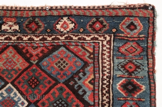 Antique Jaf Kurd bagface. Fine color and good design featuring an unusual light blue border. Large range of good natural colors. Mostly has nice thick pile, center has lower pile as shown.  ...