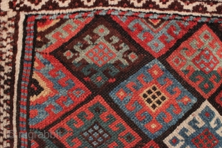 Antique Jaf Kurd bagface. Fine color and good design featuring an unusual light blue border. Large range of good natural colors. Mostly has nice thick pile, center has lower pile as shown.  ...