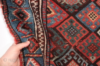 Antique Jaf Kurd bagface. Fine color and good design featuring an unusual light blue border. Large range of good natural colors. Mostly has nice thick pile, center has lower pile as shown.  ...