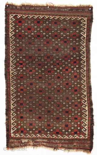 humble little antique baluch rug with a charming design I have never seen before. Thin but intact. Nice small size. 19th c. 2'3" x 3'7"        