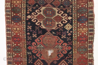 antique caucasian long rug in as found condition. An early example with unusual and elegant medallions. Beautiful border. All good natural colors. Soft and supple like cloth. A hard life with scattered  ...