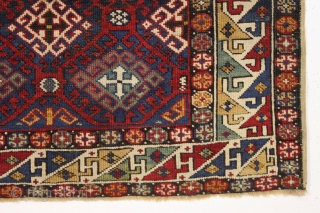 Antique very colorful little caucasian rug in good condition. Eye catching "dragons tooth" border. All good saturated natural colors featuring beautiful greens, multiple blues and nice old yellows and golds. Original selvages.  ...