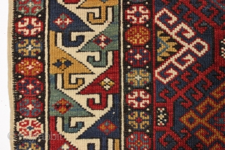 Antique very colorful little caucasian rug in good condition. Eye catching "dragons tooth" border. All good saturated natural colors featuring beautiful greens, multiple blues and nice old yellows and golds. Original selvages.  ...