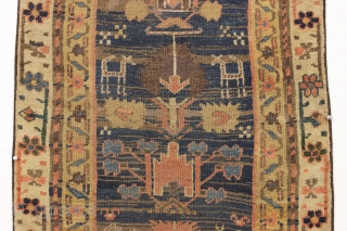 early northwest persian or kurdish rug. Strange and mysterious remnant, probably a fragment. "As found", very dirty with scattered old repairs and likely missing an outer border. Compelling. ca. 1850, possibly earlier.  ...