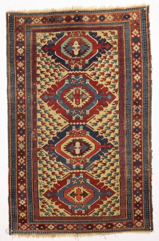 Antique small yellow ground kuba or seichour rug. Unusual field design. "As found", with nice even pile, very dirty with heavy brown oxidation. I see one very small finger size tear. Good  ...