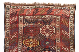 antique blue ground kazak with an allover design and a very unusual border. "as found", dirty with areas of wear as shown. Mostly fair even pile. Very fine saturated natural colors including  ...