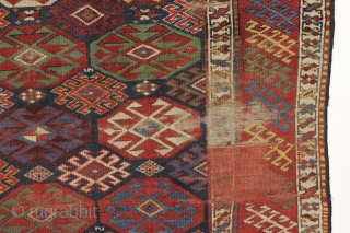 antique blue ground kazak with an allover design and a very unusual border. "as found", dirty with areas of wear as shown. Mostly fair even pile. Very fine saturated natural colors including  ...