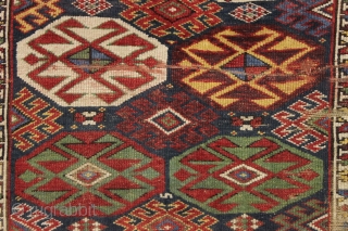 antique blue ground kazak with an allover design and a very unusual border. "as found", dirty with areas of wear as shown. Mostly fair even pile. Very fine saturated natural colors including  ...