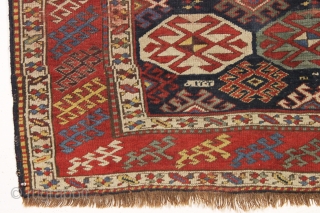 antique blue ground kazak with an allover design and a very unusual border. "as found", dirty with areas of wear as shown. Mostly fair even pile. Very fine saturated natural colors including  ...