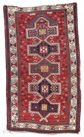 antique little kazak prayer rug. Interesting design featuring an eye catching border. All natural colors. inscribed date. As found with wear and slight edge roughness as shown. Restorable. Good age, ca. 1885.  ...