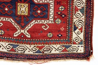 antique little kazak prayer rug. Interesting design featuring an eye catching border. All natural colors. inscribed date. As found with wear and slight edge roughness as shown. Restorable. Good age, ca. 1885.  ...