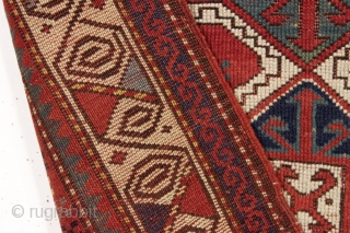 antique little kazak prayer rug. Interesting design featuring an eye catching border. All natural colors. inscribed date. As found with wear and slight edge roughness as shown. Restorable. Good age, ca. 1885.  ...