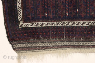 antique baluch prayer rug with a serious and muscular mihrab. All natural colors. Overall good condition with even low pile and heavy brown oxidation. Original selvages and fancy kelim ends. Ca. 1880-90.  ...