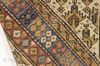 either a really big violin or a really small rug. Antique very small caucasian rug with ivory ground and classic palmette design. Overall pretty good condition and recently washed. Sweet little weaving.  ...
