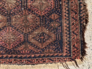 Antique Baluch bagface with classic lattice design. Older example in very worn condition and priced accordingly. Possibly of interest to someone focused on this type. All natural colors. As found in need  ...