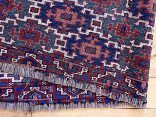 Early eye catching turkman weaving, probably an ersari trapping. Powerful Aksu design and although reduced still extra wide. Good pile. Lovely old natural colors featuring rich greens and vibrant blues. Cut and  ...