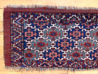 Early eye catching turkman weaving, probably an ersari trapping. Powerful Aksu design and although reduced still extra wide. Good pile. Lovely old natural colors featuring rich greens and vibrant blues. Cut and  ...