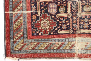 Strange remnant of an old shirvan rug with large areas of light blue cotton pile including most of the minor borders. Never seen anything quite like it before. Bad person cut rug.  ...