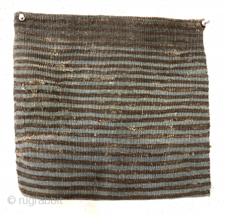 Antique small complete soumak bag. Design and construction with cotton whites indicates shahsavan origin. Original fancy striped back. Overall good condition. All natural colors with a pretty green center medallion. Reasonably clean.  ...