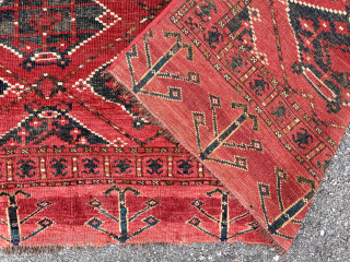 Antique turkman Chuval with an interesting uncommon design. Ersari? Both field and border are unfamiliar to me. Overall mostly decent low pile with scattered wear and oxidation. I see few old small  ...