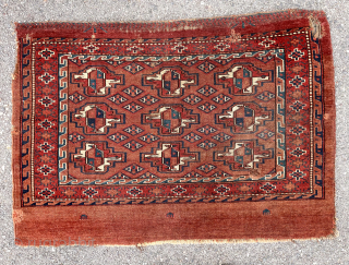 Antique turkman yomud Chuval. Spacious drawing and all natural colors. Overall evee low pile. Small hole, edge roughness and small crude old repairs. Good age, late 19th c. and possibly the least  ...