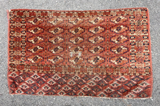 Antique turkman Tekke Chuval. Classic drawing, fine weave and blanket like soft handle. Lovely elem panel. Mostly decent low pile with center west and a couple small holes. All natural colors with  ...