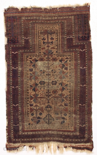 early baluch prayer rug with some interesting design features. As found, very dirty, very thin, with heavy wear and black oxidation. Unusual and attractive  border. Animals. Sophisticated and delicate drawing. Good  ...