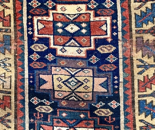 Antique northwest Persian Kurdish rug with a well known but uncommon older design. Pile varies from decent medium to very low with areas of wear showing foundation. All excellent natural colors featuring  ...