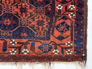 Antique small Baluch rug with classic lattice or tile design field and a lovely archaic floral meander border. Good weave and wool quality. Overall fair condition for an older rug with heavily  ...