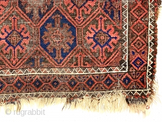 Antique small Baluch rug with a lattice or tile design field and a nearly completely oxidized ground. Good old natural colors. Overall fair condition for an older rug with some good pile.  ...