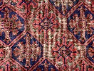 Antique small Baluch rug with a lattice or tile design field and a nearly completely oxidized ground. Good old natural colors. Overall fair condition for an older rug with some good pile.  ...