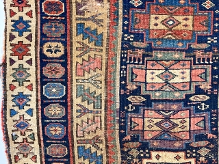 Antique northwest Persian Kurdish rug with a well known but uncommon older design. Pile varies from decent medium to very low with areas of wear showing foundation. All excellent natural colors featuring  ...