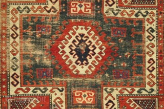 Antique caucasian Sewan rug. Early example. Thin with wear "as found". All good natural colors including a deep green center medallion. Heavy oxidation. Washed but no repairs. Structurally sound. Mid 19th c.  ...