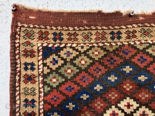 Early small Anatolian rug in good condition. Unusual diminutive size and uncommon design. West Anatolian? Bergama? Overall low even pile. Original end flat weave and fancy selvages. All natural colors featuring pretty  ...
