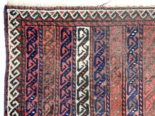 Antique Baluch rug with an interesting striped or cane design. I’ve had a number of striped Baluch rugs but none with this particular design. All good natural colors featuring several reds. Good  ...