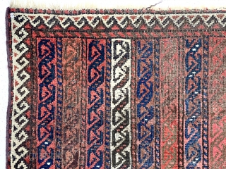 Antique Baluch rug with an interesting striped or cane design. I’ve had a number of striped Baluch rugs but none with this particular design. All good natural colors featuring several reds. Good  ...