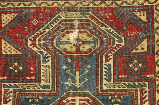 Antique little caucasian rug fragment. Diminutive. Older "keyhole" type. All good natural colors. Rough and dirty condition as shown.  ca. 1875, probably older. 2' x 2'3"      