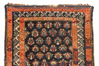 antique small caucasian rug with an attractive design and some unusual features. Good overall pile and all natural colors including a most unusual blue ground which appears to be natural brown wool  ...