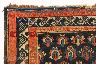 antique small caucasian rug with an attractive design and some unusual features. Good overall pile and all natural colors including a most unusual blue ground which appears to be natural brown wool  ...