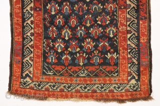 antique small caucasian rug with an attractive design and some unusual features. Good overall pile and all natural colors including a most unusual blue ground which appears to be natural brown wool  ...