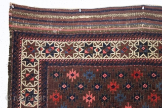 antique baluch rug with very intense color and highest quality weave. Uncommon design. Symmetrically knotted with typical use of many vibrant hues. Probably a synthetic pink. Good even pile with fine weave  ...