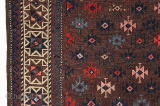 antique baluch rug with very intense color and highest quality weave. Uncommon design. Symmetrically knotted with typical use of many vibrant hues. Probably a synthetic pink. Good even pile with fine weave  ...