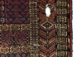 Antique tekke ensi. As found, very very dirty and with various holes and a corner rounding as shown. Mostly good pile with some light scattered wear. Colors appear natural with no color  ...